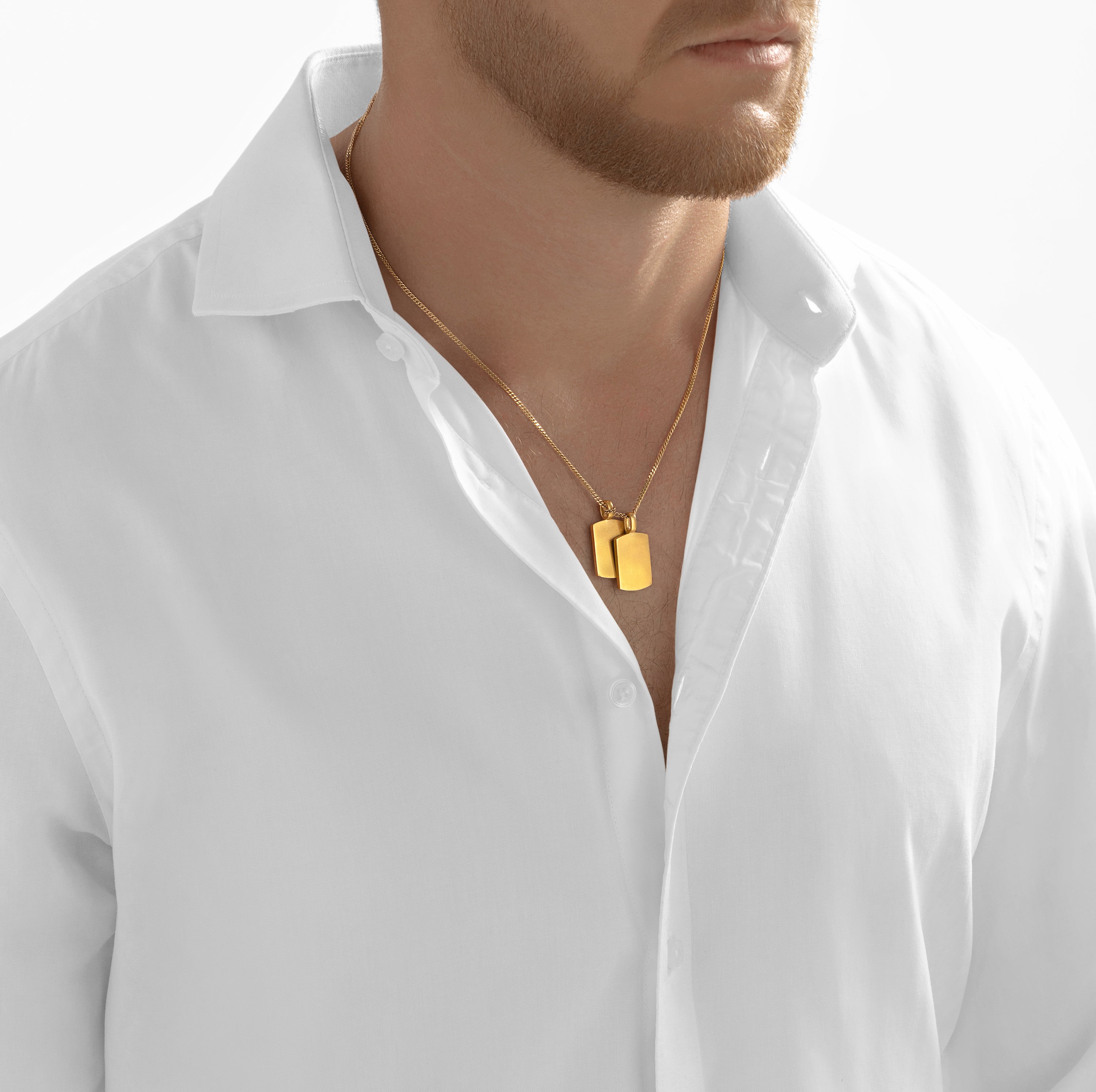 Bonded gold dog tag pendant pair