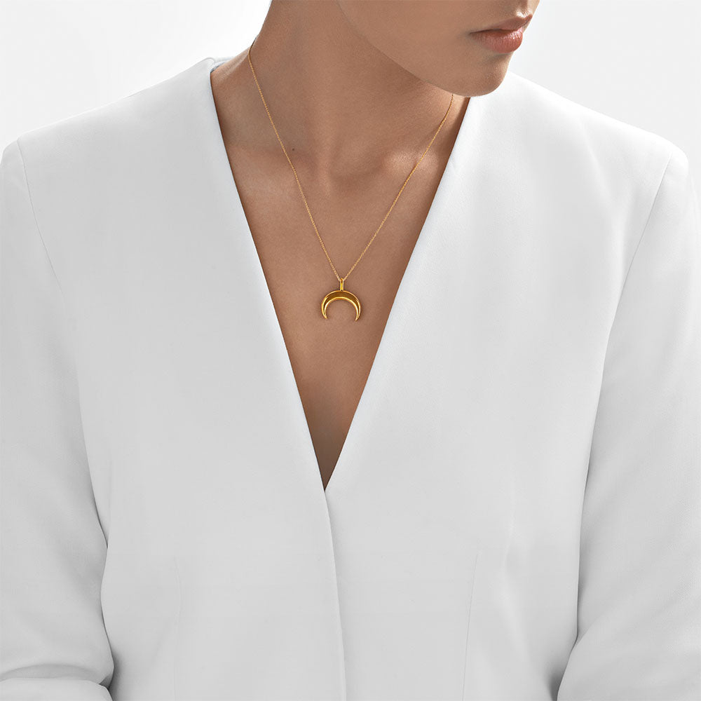 '- Crescent moon gold pendant styled